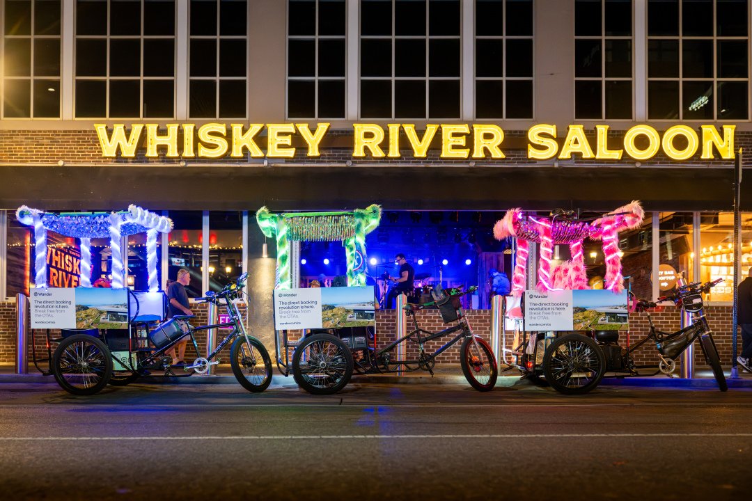 Pedicab Advertising Broadway, Nashville. Pedicabs with Advertising lined up in front of Whiskey River Saloon in Nashville on Broadway.